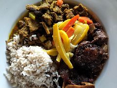 04D The oxtail and goat curry was amazing for our lunch main on the patio of The Great House Strawberry Hill Resort near Kingston Jamaica